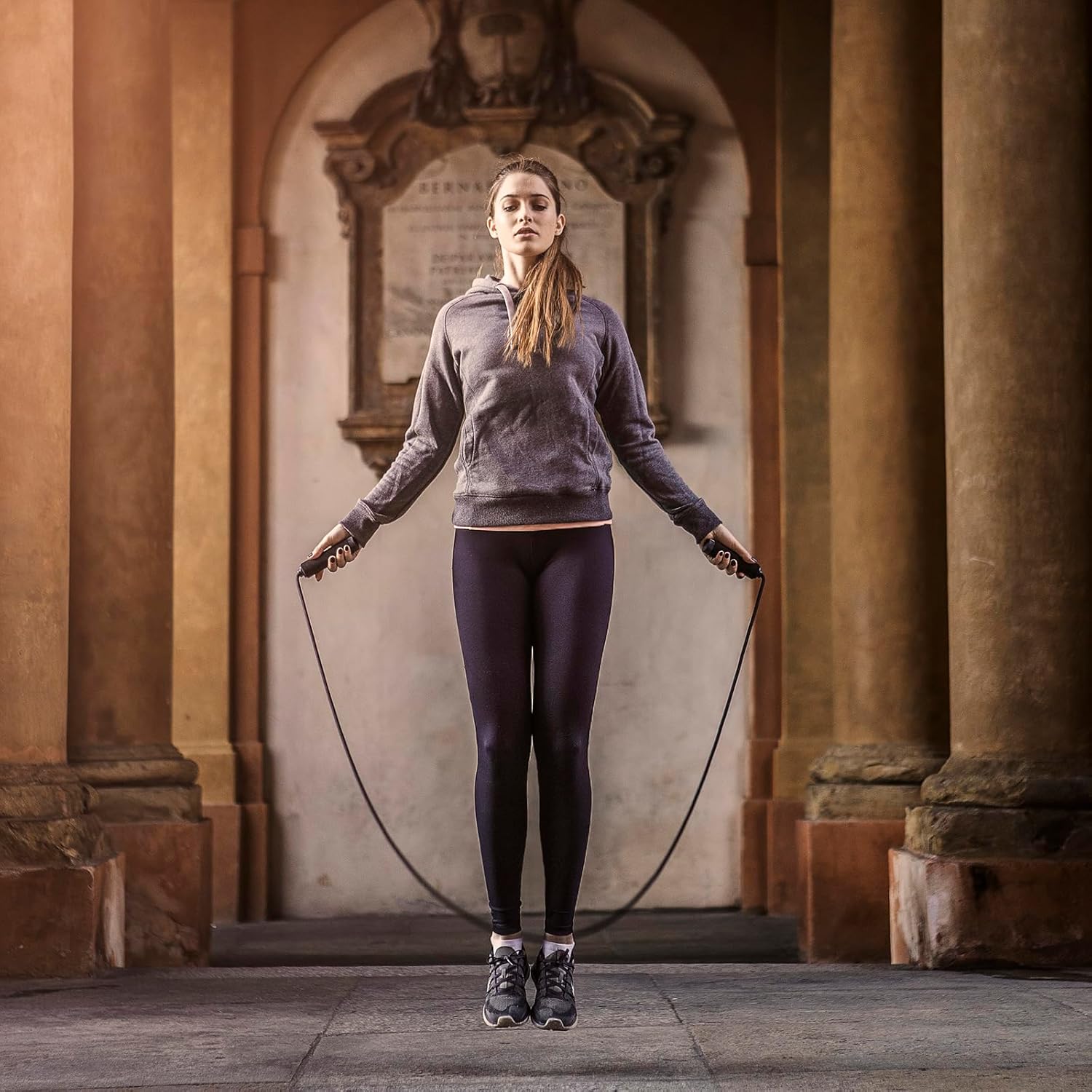 Medivita SpeedRope in use by a woman for cardio and fitness training indoors.